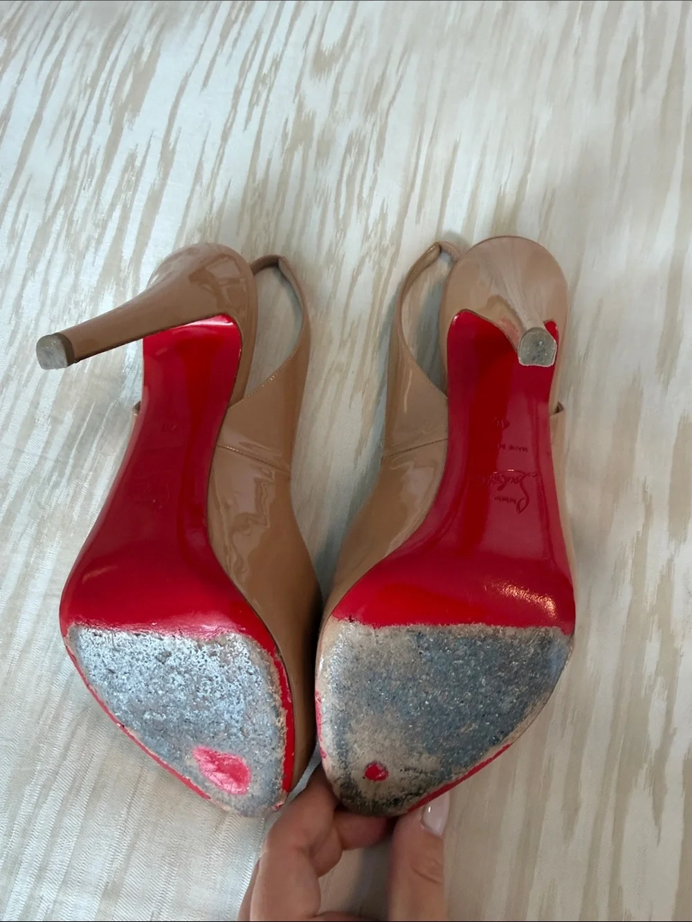Christian Louboutin glossy beige
